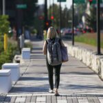 Woman walking on Lexington trail path