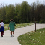 People walking on trail path